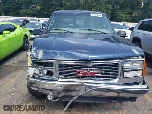 1999 GMC Suburban z VIN 3GKFK16R2XG544767, wystawiony jako Copart lot #67078414 z przebiegiem 154 145 mil mil oraz Szkoda całkowita • Salvage title. Historia ofert i sprzedaży dostępna na DreamBid. Obrazek 5.