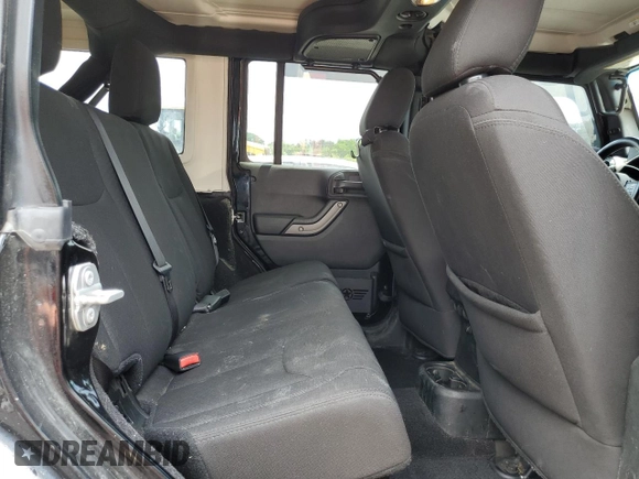 2017 Jeep Wrangler Unlimited Sport with VIN 1C4BJWDG3HL738241, listed as a Copart auction lot 60310865 with 113,526 mi miles and Salvage title. Bid and sale history available at DreamBid. Image 11.