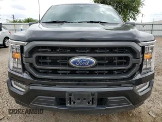 2023 Ford F-150 XL z VIN 1FTEW1CP9PKD18927, wystawiony jako Copart lot #54132925 z przebiegiem 57 592 mil mil oraz Szkoda całkowita • Salvage title. Historia ofert i sprzedaży dostępna na DreamBid. Obrazek 5.