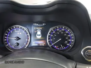 2015 Infiniti Q50 Premium with VIN JN1BV7AP4FM330386, listed as a IAAI auction lot 42028771 with 75,533 mi miles. Bid and sale history available at carsss.com. Image 7.