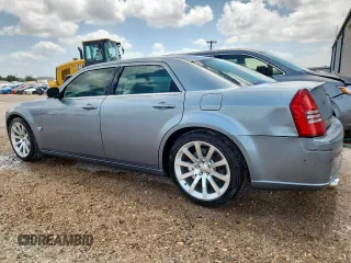 2006 Chrysler 300 C SRT-8 z VIN 2C3LA73W36H377854, wystawiony jako Copart lot #61070615 z przebiegiem 260 778 mil mil oraz Czysty tytuł • Clean title. Historia ofert i sprzedaży dostępna na DreamBid. Obrazek 2.