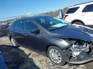 2017 Ford Focus S z VIN 1FADP3E29HL269607, wystawiony jako IAAI lot #41654836 z przebiegiem 101 645 mil mil oraz . Historia ofert i sprzedaży dostępna na DreamBid. Obrazek 13.