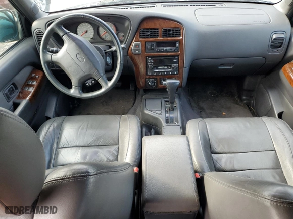 1999 Infiniti QX4 Luxury with VIN JNRAR07Y3XW064787, listed as a Copart auction lot 80981484 with 0 miles and Salvage Title. Bid and sale history available at carsss.com. Image 7.