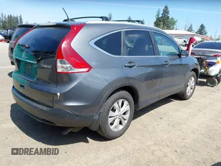 2014 Honda CR-V EX-L with VIN 5J6RM4H79EL077096, listed as a IAAI auction lot 42153513 with 104,972 mi miles and . Bid and sale history available at DreamBid. Image 4.