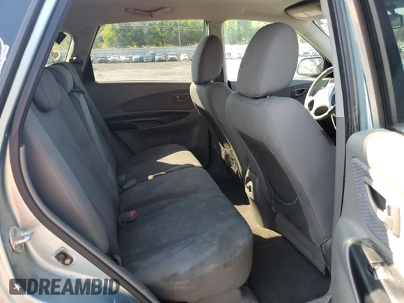 2009 Hyundai Tucson GLS with VIN KM8JM12B29U953176, listed as a Copart auction lot 70141174 with 77,132 mi miles and Salvage Title. Bid and sale history available at carsss.com. Image 11.