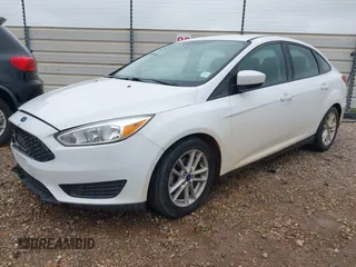 2018 Ford Focus SE z VIN 1FADP3F23JL225333, wystawiony jako IAAI lot #41758445 z przebiegiem 133 307 mil mil oraz . Historia ofert i sprzedaży dostępna na DreamBid. Obrazek 2.