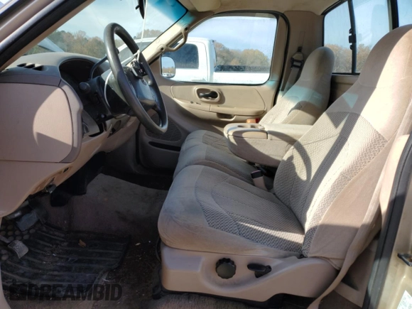1999 Ford F-150 XL с VIN 1FTRF17L2XKA36749, выставлен на аукционе Copart как лот 84671444 с пробегом 148 338 миль миль и Списание • Salvage title. История ставок и продаж доступна на DreamBid. Изображение 7.