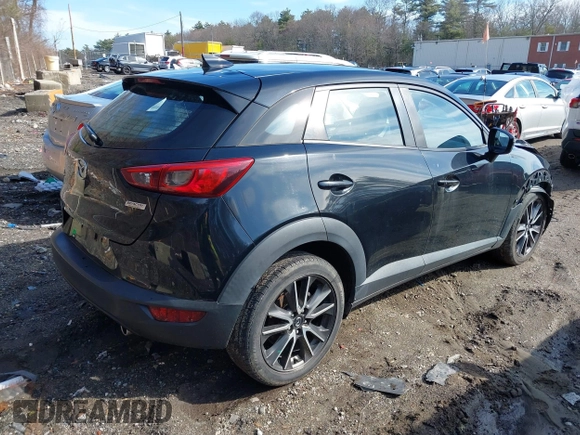 2017 Mazda CX-3 Touring with VIN JM1DKFC70H0171771, listed as a IAAI auction lot 41870395 with 100,472 mi miles. Bid and sale history available at carsss.com. Image 4.
