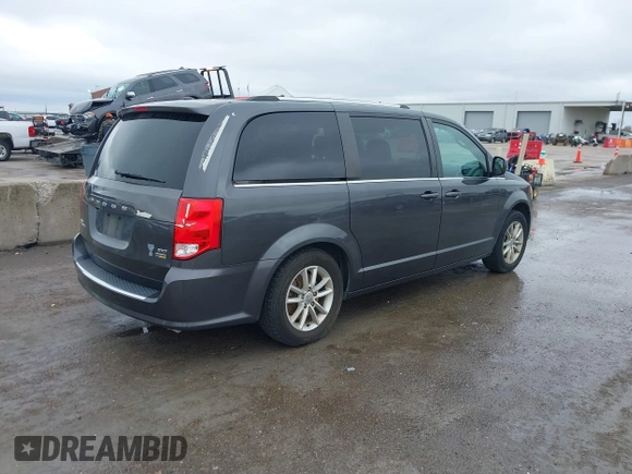 2019 Dodge Grand Caravan SXT with VIN 2C4RDGCG3KR543221, listed as a IAAI auction lot 41528859 with 129,778 mi miles and . Bid and sale history available at DreamBid. Image 4.