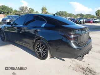 2014 Infiniti Q50 Premium with VIN JN1BV7AP0EM689359, listed as a IAAI auction lot 42671613 with 152,334 mi miles and . Bid and sale history available at DreamBid. Image 3.