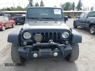 2018 Jeep Wrangler Unlimited Sport z VIN 1C4BJWDG4JL932122, wystawiony jako IAAI lot #42618973 z przebiegiem 66 494 mil mil oraz . Historia ofert i sprzedaży dostępna na DreamBid. Obrazek 13.