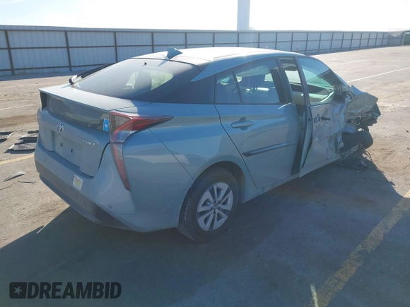 2018 Toyota Prius Two with VIN JTDKARFU1J3057604, listed as a IAAI auction lot 41446327 with 72,023 mi miles. Bid and sale history available at carsss.com. Image 4.