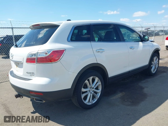 2011 Mazda CX-9 Grand Touring with VIN JM3TB3DA0B0311353, listed as a IAAI auction lot 42085234 with 156,578 mi miles and . Bid and sale history available at DreamBid. Image 4.