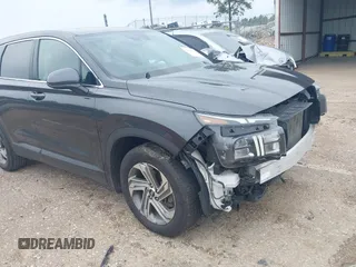 2021 Hyundai Santa Fe SE with VIN 5NMS14AJ5MH346250, listed as a IAAI auction lot 42299607 with 50,643 mi miles and . Bid and sale history available at DreamBid. Image 19.