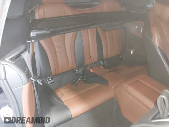 2023 BMW 8 Series with VIN WBAFY4C07PCM50546, listed as a IAAI auction lot 42403241 with 15,697 mi miles and . Bid and sale history available at DreamBid. Image 8.