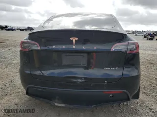 2023 Tesla Model Y Long Range with VIN 7SAYGAEE5PF880779, listed as a Copart auction lot 50777585 with 22,135 mi miles and Salvage Title. Bid and sale history available at carsss.com. Image 6.