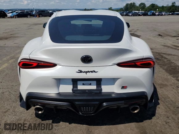 2023 Toyota Supra 3.0 with VIN WZ1DB0G09PW060627, listed as a Copart auction lot 65894025 with 26,657 mi miles and Salvage title. Bid and sale history available at DreamBid. Image 6.