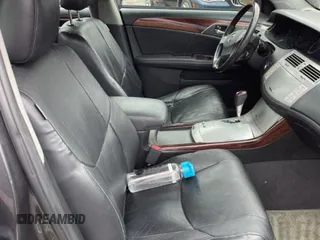 2010 Toyota Avalon XL with VIN 4T1BK3DB5AU353288, listed as a Copart auction lot 56857935 with 233,775 mi miles and Clean Title. Bid and sale history available at DreamBid. Image 5.