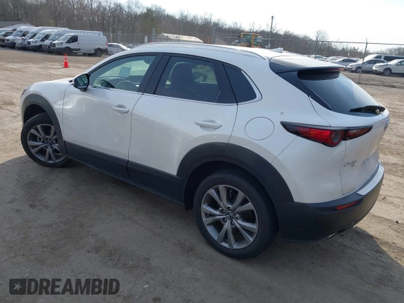 2022 Mazda CX-30 S Premium with VIN 3MVDMBDL7NM412263, listed as a IAAI auction lot 41779877 with 42,088 mi miles and . Bid and sale history available at carsss.com. Image 3.