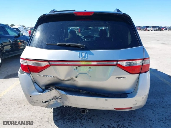 2012 Honda Odyssey Touring with VIN 5FNRL5H9XCB095283, listed as a IAAI auction lot 41479598 with NaN miles. Bid and sale history available at carsss.com. Image 17.