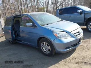 2007 Honda Odyssey EX z VIN 5FNRL384X7B049838, wystawiony jako IAAI lot #41686472 z przebiegiem 267 685 mil mil oraz . Historia ofert i sprzedaży dostępna na DreamBid. Obrazek 1.