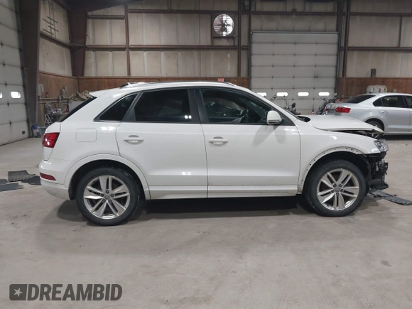 2017 Audi Q3 Premium z VIN WA1ECCFS0HR009385, wystawiony jako IAAI lot #42042437 z przebiegiem 110 341 mil mil oraz . Historia ofert i sprzedaży dostępna na DreamBid. Obrazek 14.