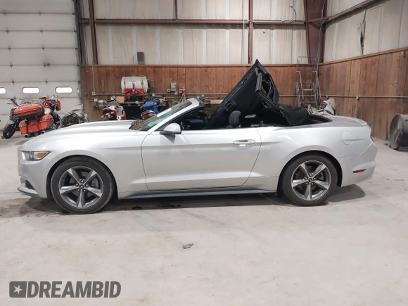 2016 Ford Mustang V6 z VIN 1FATP8EM2G5216177, wystawiony jako IAAI lot #41716137 z przebiegiem 73 332 mil mil oraz . Historia ofert i sprzedaży dostępna na DreamBid. Obrazek 14.