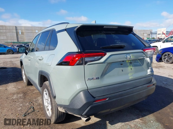 2021 Toyota RAV4 XLE with VIN 2T3W1RFV6MW163395, listed as a IAAI auction lot 42455461 with 65,840 mi miles and . Bid and sale history available at DreamBid. Image 3.