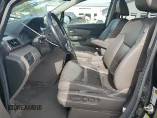 2014 Honda Odyssey Touring z VIN 5FNRL5H94EB006827, wystawiony jako Copart lot #55859715 z przebiegiem 195 131 mil mil oraz Szkoda całkowita • Salvage title. Historia ofert i sprzedaży dostępna na DreamBid. Obrazek 7.