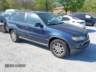 2005 BMW X5 3.0i with VIN 5UXFA13505LY15694, listed as a IAAI auction lot 42051677 with 104,559 mi miles. Bid and sale history available at carsss.com. Image 1.