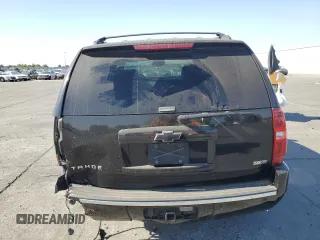 2009 Chevrolet Tahoe LTZ with VIN 1GNFK33089R139455, listed as a Copart auction lot 58953995 with 176,029 mi miles and Salvage title. Bid and sale history available at DreamBid. Image 6.