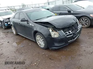2013 Cadillac CTS Luxury z VIN 1G6DG5E52D0111849, wystawiony jako IAAI lot #42130235 z przebiegiem 129 993 mil mil oraz . Historia ofert i sprzedaży dostępna na DreamBid. Obrazek 1.