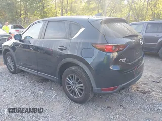 2017 Mazda CX-5 Touring with VIN JM3KFBCL6H0170455, listed as a IAAI auction lot 40381242 with 71,520 mi miles. Bid and sale history available at carsss.com. Image 3.