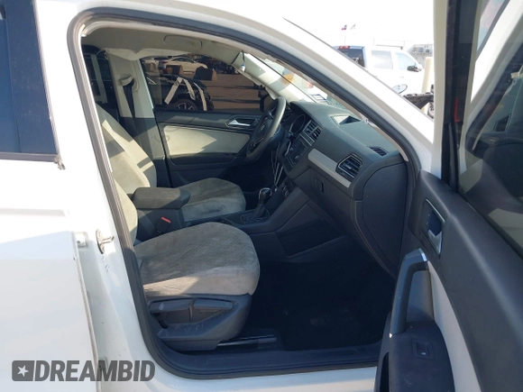 2018 Volkswagen Tiguan S with VIN 3VV1B7AX1JM119971, listed as a IAAI auction lot 42039977 with 108,932 mi miles and . Bid and sale history available at DreamBid. Image 5.