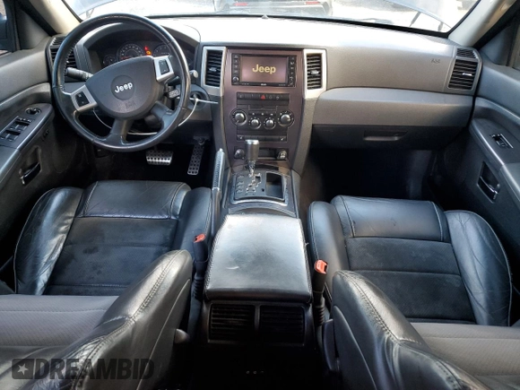 2008 Jeep Grand Cherokee SRT-8 with VIN 1J8HR78368C223775, listed as a Copart auction lot 76807824 with 156,937 mi miles and Clean Title. Bid and sale history available at carsss.com. Image 8.