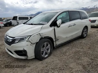 2018 Honda Odyssey EX-L with VIN 5FNRL6H71JB059936, listed as a Copart auction lot 53403635 with 94,745 mi miles and Salvage Title. Bid and sale history available at DreamBid. Image 1.