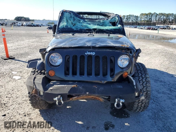 2012 Jeep Wrangler Sport with VIN 1C4AJWAG4CL227968, listed as a Copart auction lot 45925685 with 134,755 mi miles and Salvage title. Bid and sale history available at DreamBid. Image 5.
