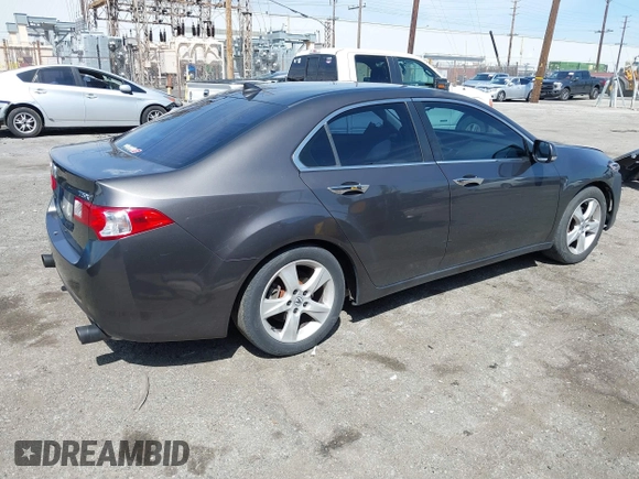 2010 Acura TSX with VIN JH4CU2F67AC038297, listed as a IAAI auction lot 41844587 with 136,741 mi miles and . Bid and sale history available at DreamBid. Image 4.