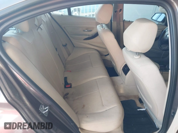 2013 BMW 3 Series 320i with VIN WBA3B1C54DK129838, listed as a IAAI auction lot 42752788 with 95,262 mi miles and . Bid and sale history available at DreamBid. Image 8.
