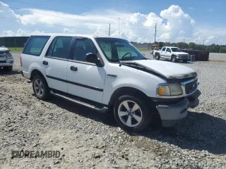 1997 Ford Expedition XLT with VIN 1FMEU17L2VLB74797, listed as a Copart auction lot 61377745 with 236,140 mi miles and Salvage title. Bid and sale history available at DreamBid. Image 4.