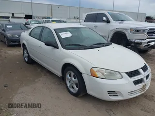 2005 Dodge Stratus SXT z VIN 1B3EL46X75N630859, wystawiony jako IAAI lot #41334447 z przebiegiem 155 434 mil mil oraz . Historia ofert i sprzedaży dostępna na DreamBid. Obrazek 1.