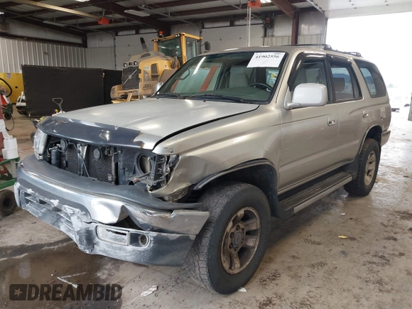 1999 Toyota 4Runner SR5 z VIN JT3HN86R8X0221532, wystawiony jako IAAI lot #41902556 z przebiegiem 406 602 mil mil oraz . Historia ofert i sprzedaży dostępna na DreamBid. Obrazek 18.