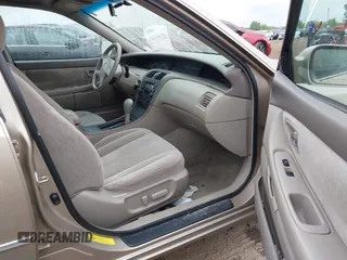 2001 Toyota Avalon XL z VIN 4T1BF28B41U172837, wystawiony jako IAAI lot #42350664 z przebiegiem 150 111 mil mil oraz . Historia ofert i sprzedaży dostępna na DreamBid. Obrazek 5.