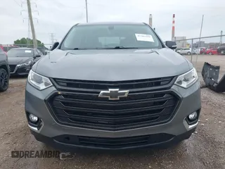 2020 Chevrolet Traverse LT Cloth z VIN 1GNERGKW4LJ118712, wystawiony jako IAAI lot #42382598 z przebiegiem 107 192 mil mil oraz . Historia ofert i sprzedaży dostępna na DreamBid. Obrazek 13.