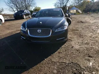 2015 Jaguar XJ Portfolio with VIN SAJWJ2GD1F8V77420, listed as a Copart auction lot 81786334 with 129,190 mi miles and Salvage title. Bid and sale history available at DreamBid. Image 11.