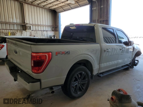 2023 Ford F-150 XL with VIN 1FTFW1E88PFD22387, listed as a Copart auction lot 49795405 with 14,057 mi miles and Salvage Title. Bid and sale history available at carsss.com. Image 3.