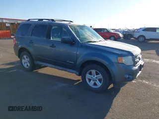 2010 Ford Escape Hybrid z VIN 1FMCU5K34AKB31844, wystawiony jako IAAI lot #41462449 z przebiegiem 145 475 mil mil oraz . Historia ofert i sprzedaży dostępna na DreamBid. Obrazek 1.