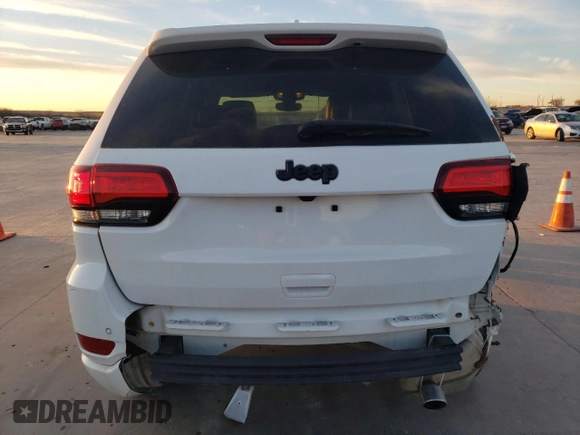 2022 Jeep Grand Cherokee Laredo X with VIN 1C4RJEAG4NC154150, listed as a Copart auction lot 42042685 with 64,155 mi miles and Salvage title. Bid and sale history available at DreamBid. Image 6.
