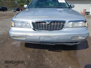 1997 Mercury Grand Marquis LS with VIN 2MELM75W3VX717801, listed as a IAAI auction lot 41920075 with 173,730 mi miles and . Bid and sale history available at DreamBid. Image 6.
