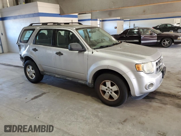 2010 Ford Escape XLS with VIN 1FMCU9C78AKA44179, listed as a Copart auction lot 80518154 with 175,149 mi miles and Salvage title. Bid and sale history available at DreamBid. Image 4.